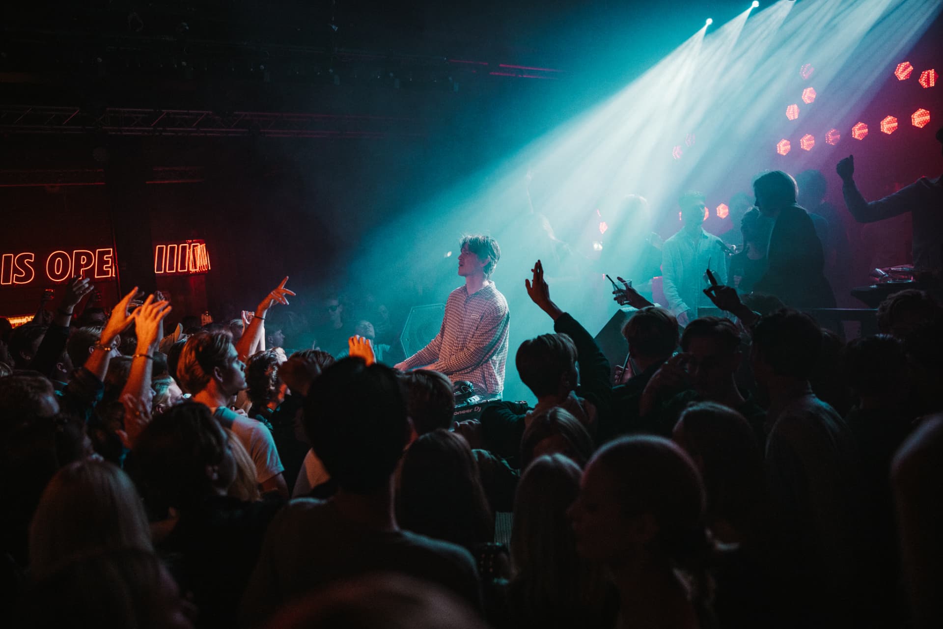DJ set with the crowd reaching out